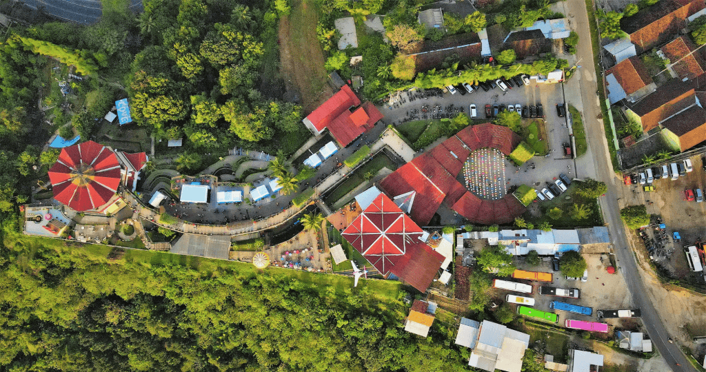 Aerial view of developed property and surrounding landscape